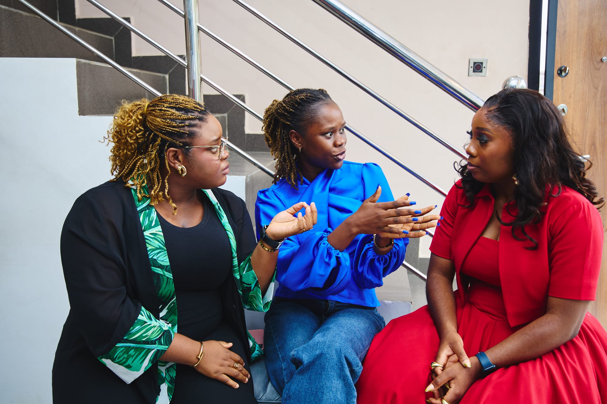 Bolaji, Omolola and an attendee rubbing minds at the event