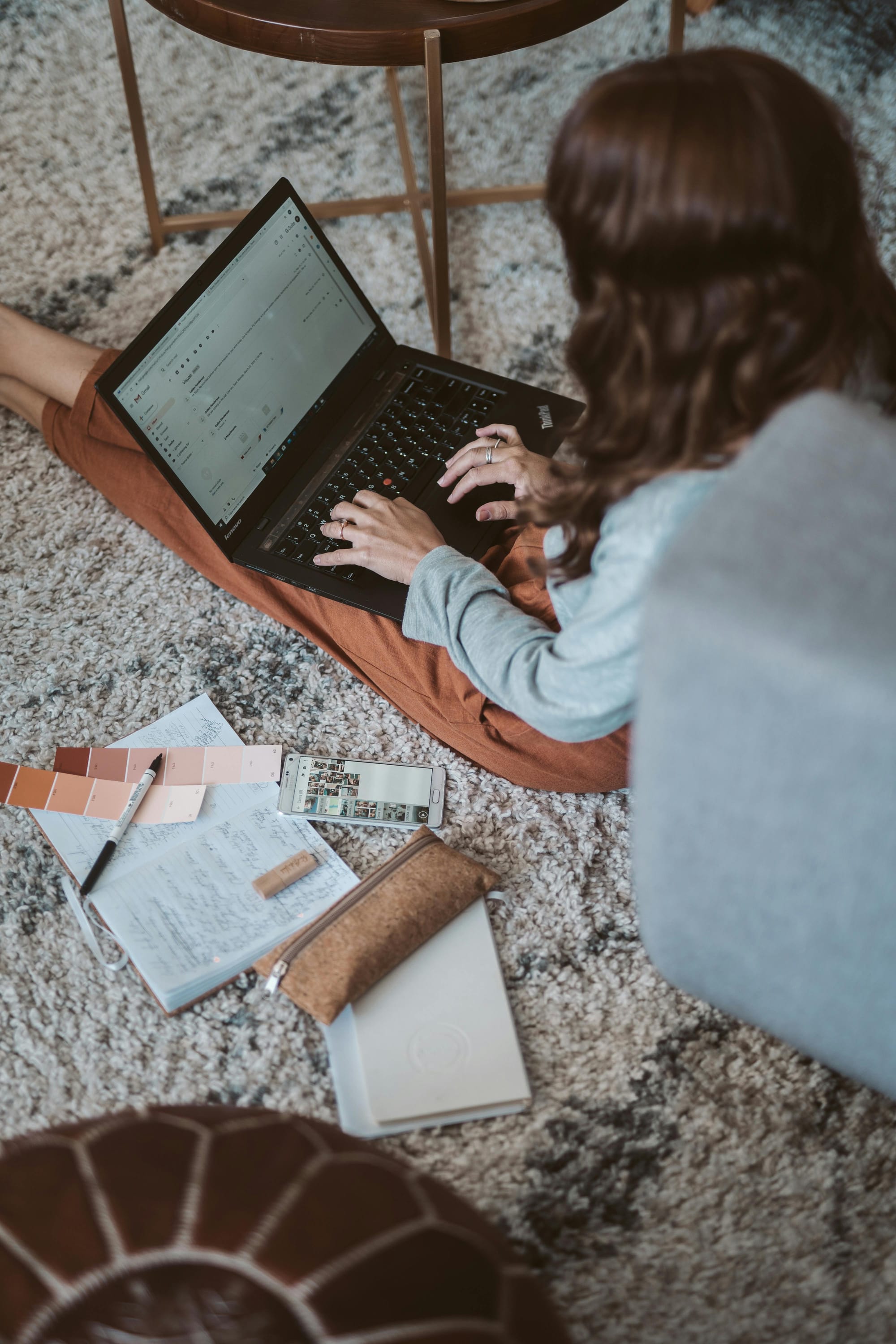 A woman checking her email inbox